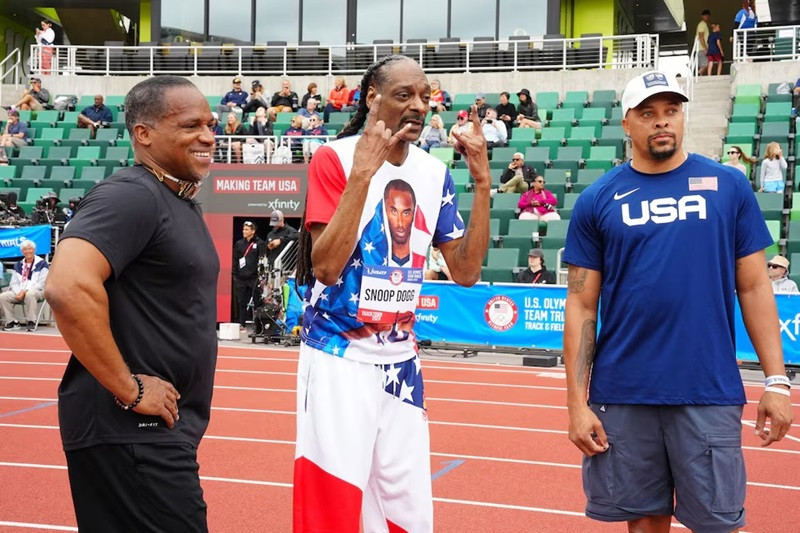 Jun 23, 2024; Eugene, OR, USA; Ato Boldon (left), Snoop Dogg (centre) and Wallace Spearmon pose during the US Olympic Team Trials at Hayward Field. PHOTO: REUTERS