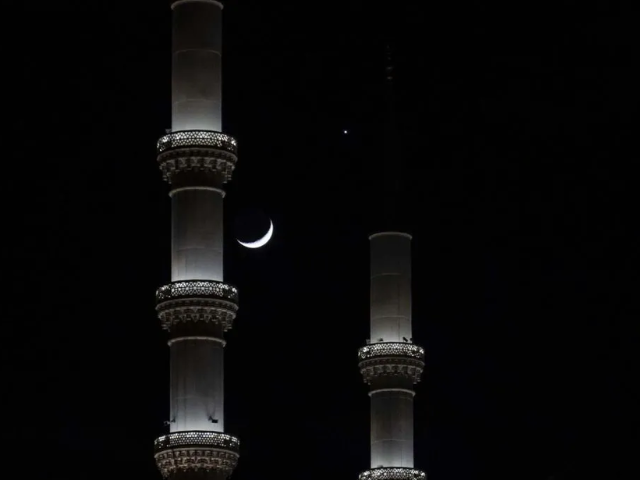 In Turkey's capital Ankara the Moon and Venus are seen together alongside the Kocatepe Mosque. Getty