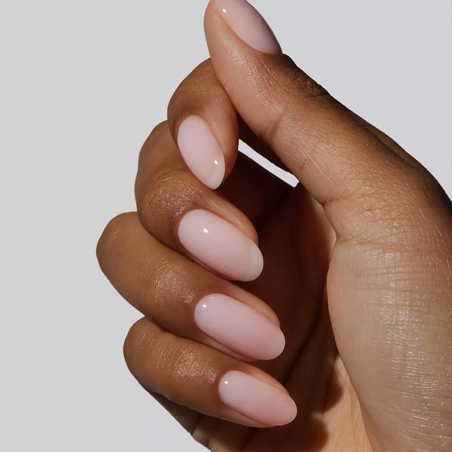 a milky pink manicure 