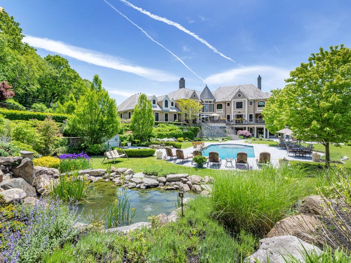 The house has a pool and a pond.