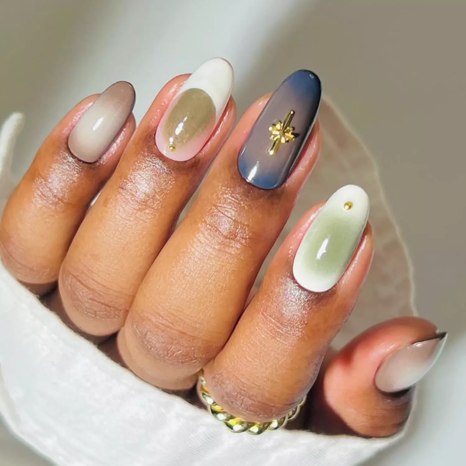 Earth-Toned Mismatched Manicure