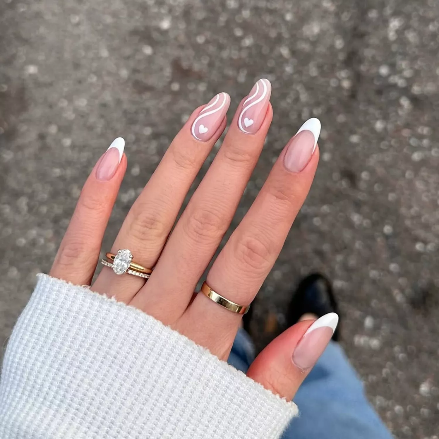 White French Manicure with Swirls and Heart Accents