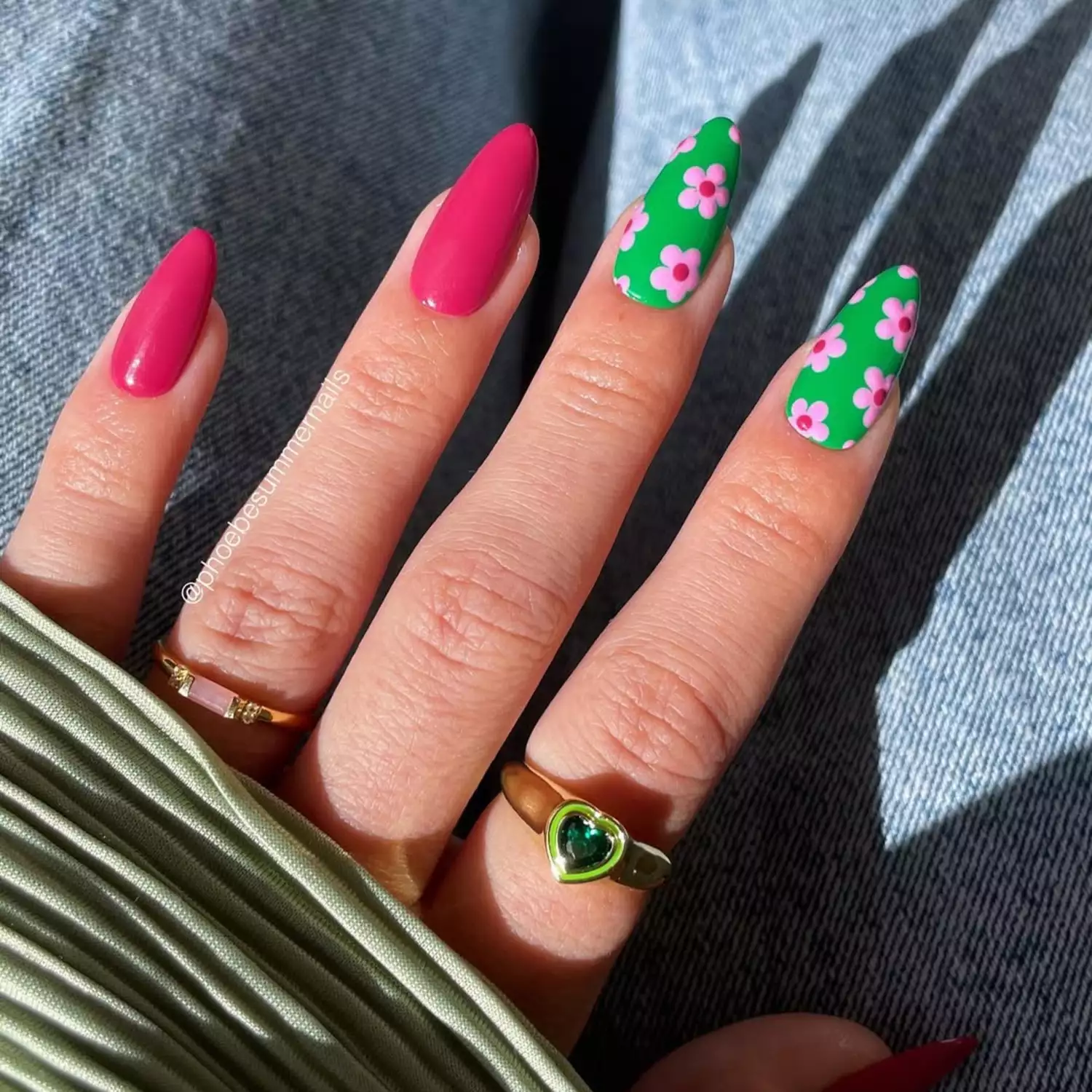 Hot pink manicure with green accent nails with pink daisies