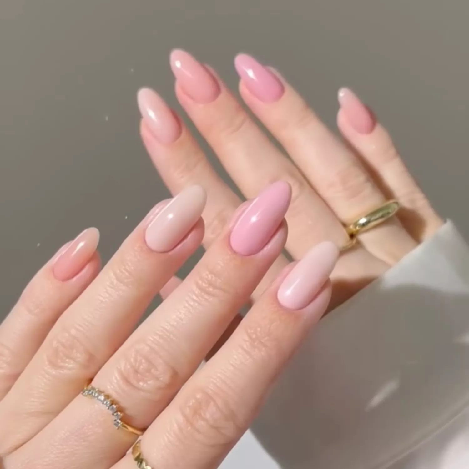 Manicure with multiple sheer pink shades