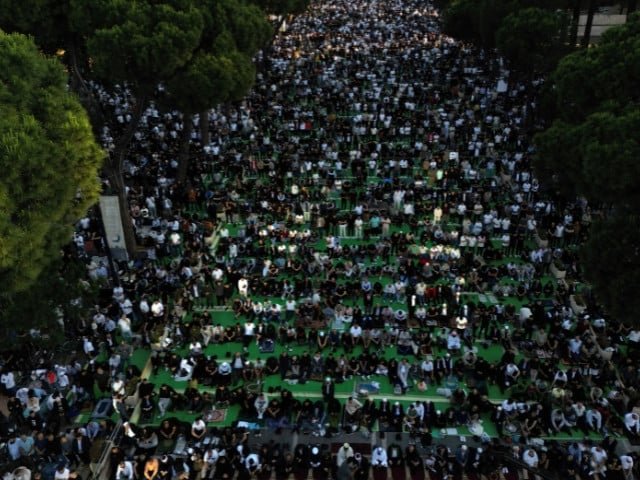 A drone view shows Albanian Muslims attending morning prayers during Eidul Azha celebrations at the main boulevard, in Tirana, Albania, on May 27, 2026. PHOTO: REUTERS