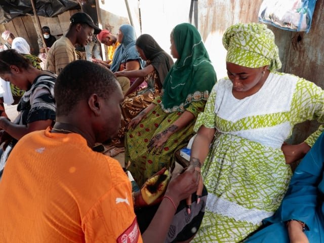 Muslim women get henna applied in preparation for Eidul Azha in Adjame, Abidjan, Ivory Coast, on May 26, 2026. PHOTO: REUTERS