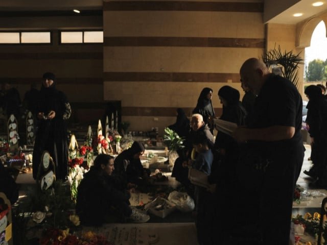 People visit the graves of their loved ones on Eidul Azha, in Beirut southern suburbs, Lebanon, on May 27, 2026. PHOTO: REUTERS