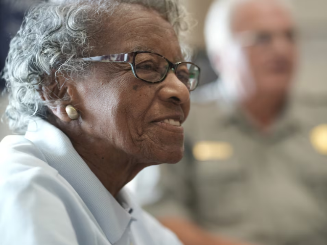 Volunteer, Nell Draper-Winston greets visitors at the Maggie Walker National Historical Site in Richmond, Virginia, U.S., June 26, 2026. REUTERS/Jay Paul