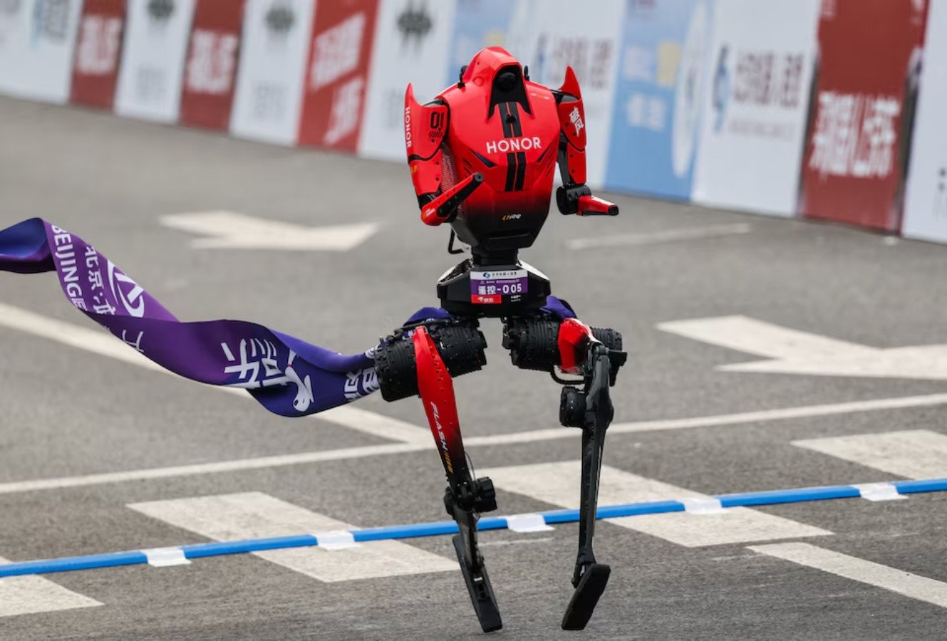 A Lightning humanoid robot by Honor crosses the finish line of the second Beijing E-Town Half Marathon and Humanoid Robot Half Marathon in Beijing, China April 19, 2026.